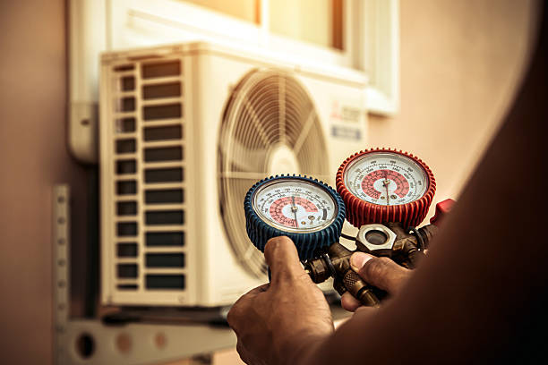 Professional Heat Pump Repair technician working in Taylorville, IL
